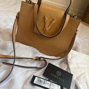 VERSACE
Saffiano Virtus Top Handle Shoulder Bag Camel